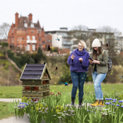 Two women using Chester Zoo's new 'Wild Wander' app