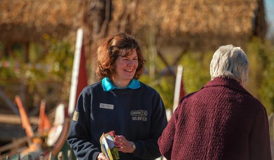 Volunteer Handing Out Leaflets At The Zoo